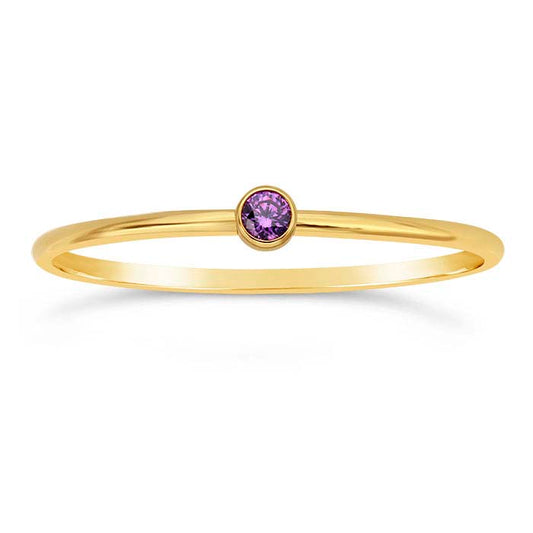 Bague en or jaune 14/20 remplie, sertie de CZ violette