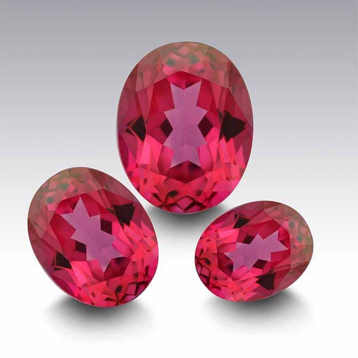 Azotic® Hot Pink Topaz 10 x 8mm Oval Faceted Gemstone