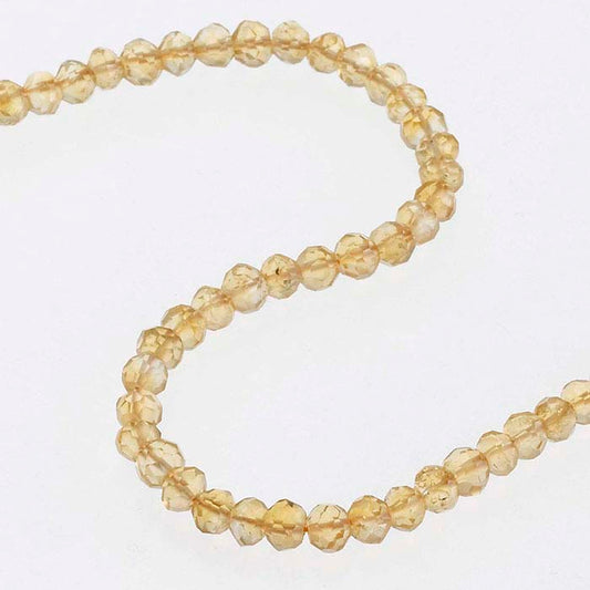 Citrin 4 mm fasetterad knapppärla, sträng