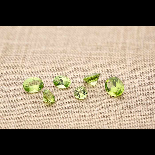 American Mined™ Arizona Peridot 5mm Round Faceted Gemstone