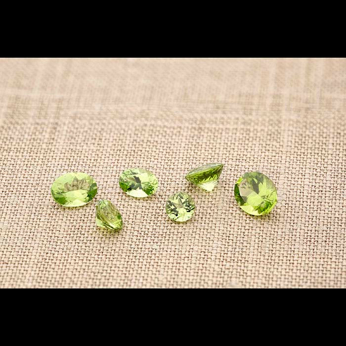American Mined™ Arizona Peridot 7mm Round Faceted Gemstone